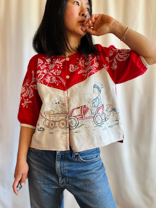 Little children play button top