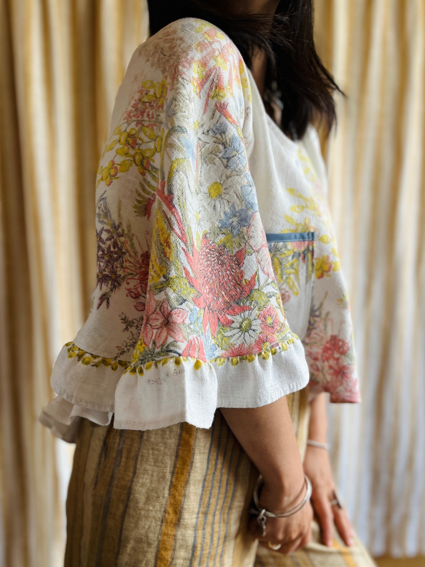 Circular and diagonal cut linen blouse