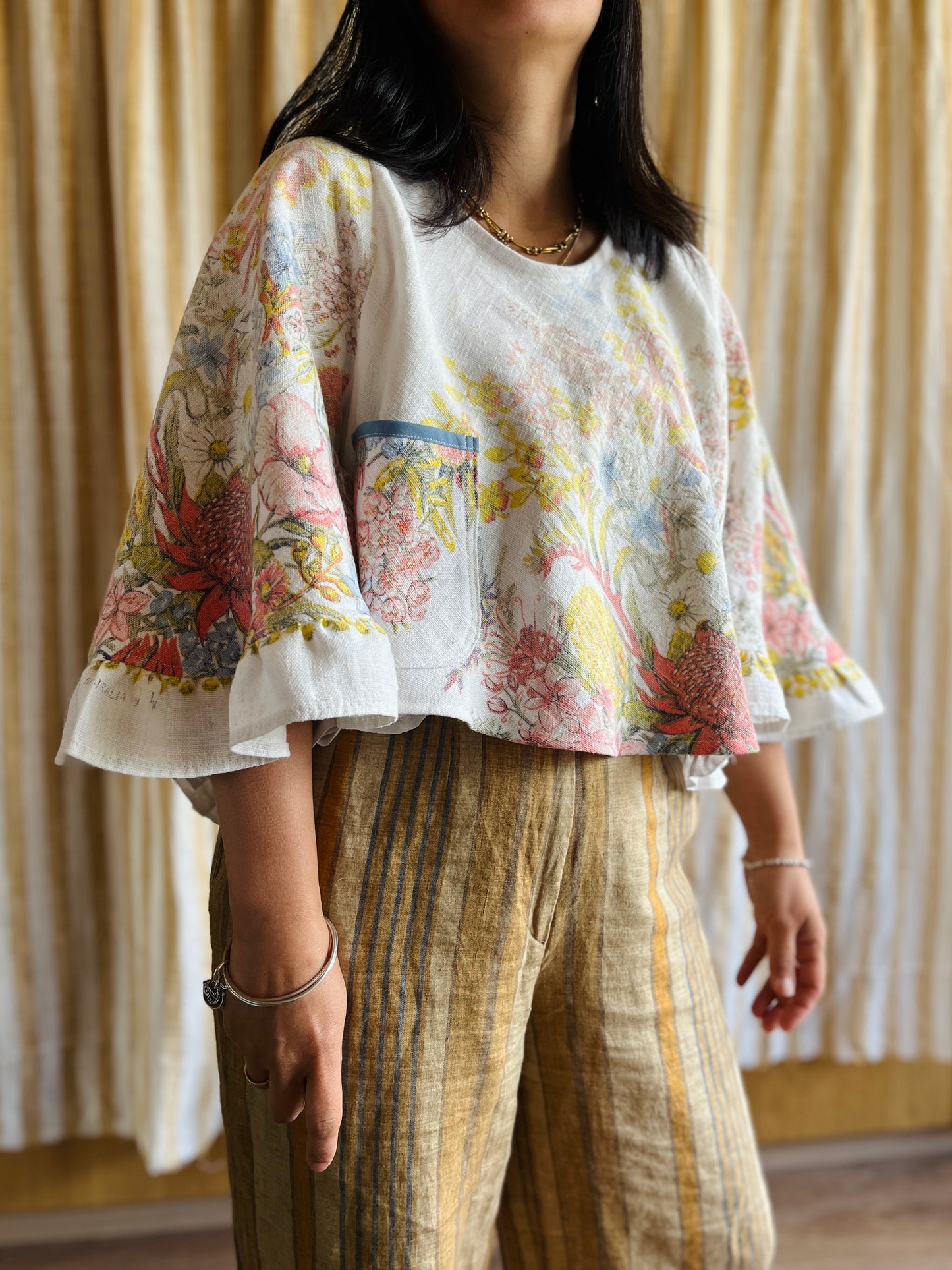 Circular and diagonal cut linen blouse