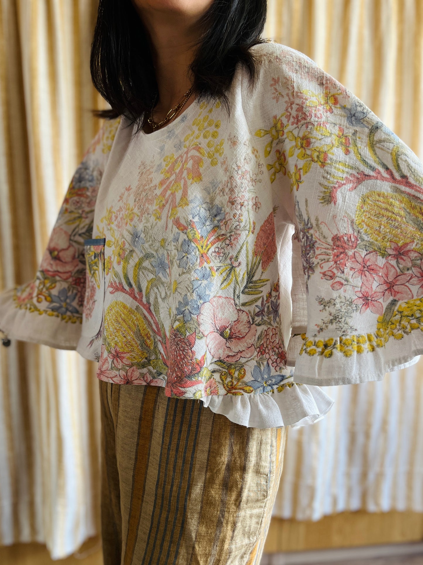 Circular and diagonal cut linen blouse