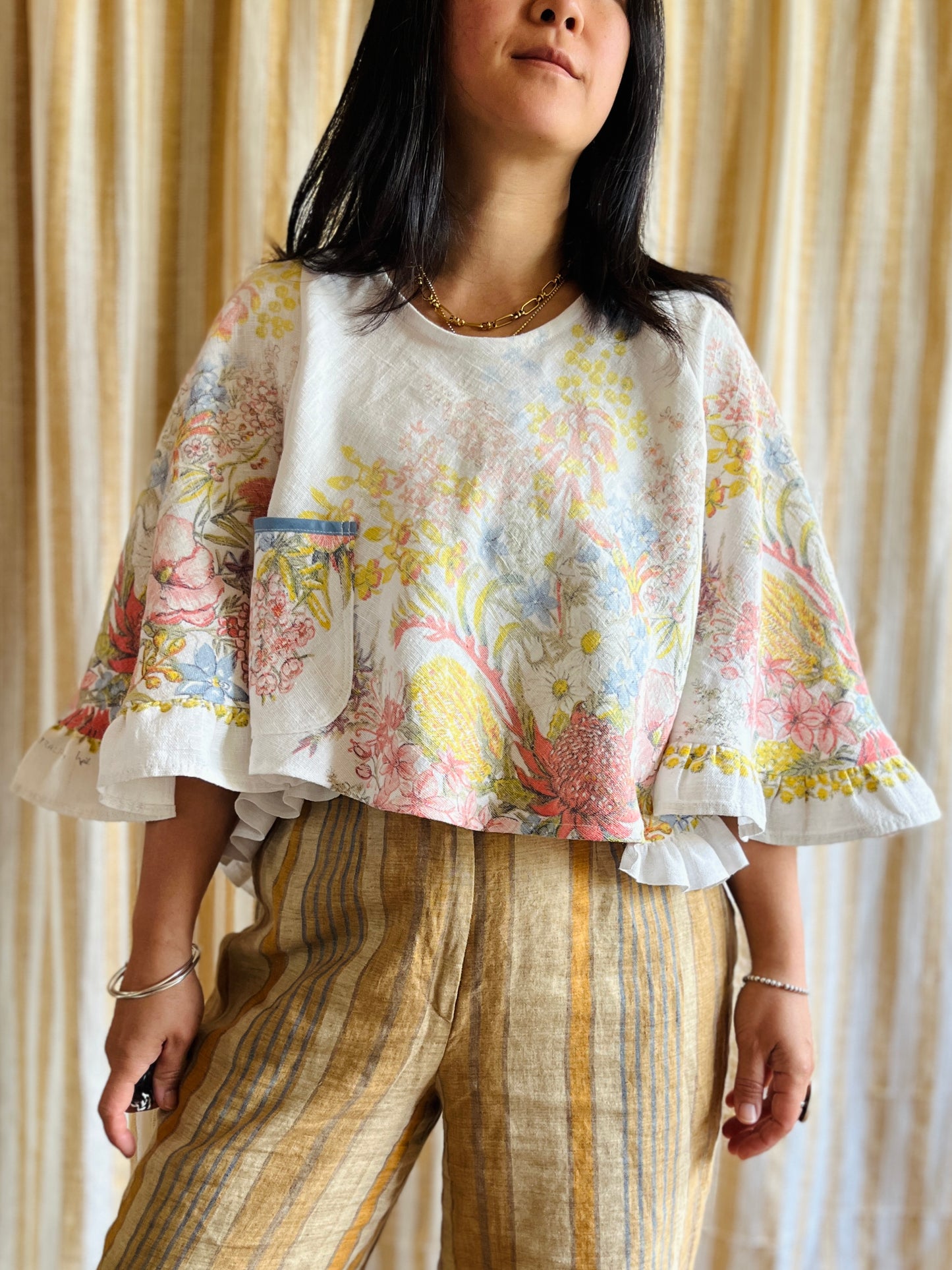 Circular and diagonal cut linen blouse