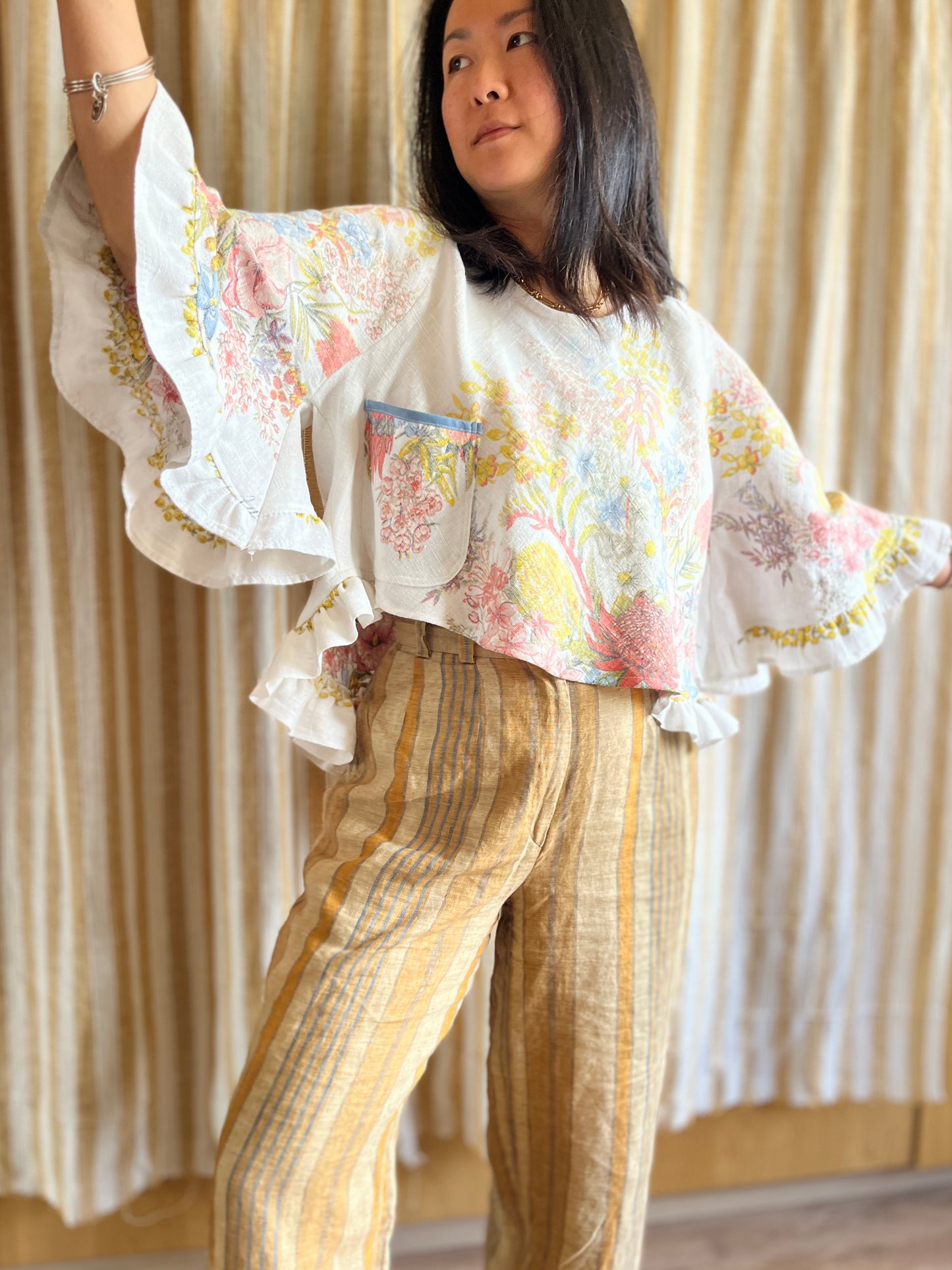 Circular and diagonal cut linen blouse