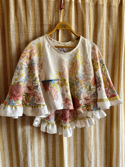 Circular and diagonal cut linen blouse