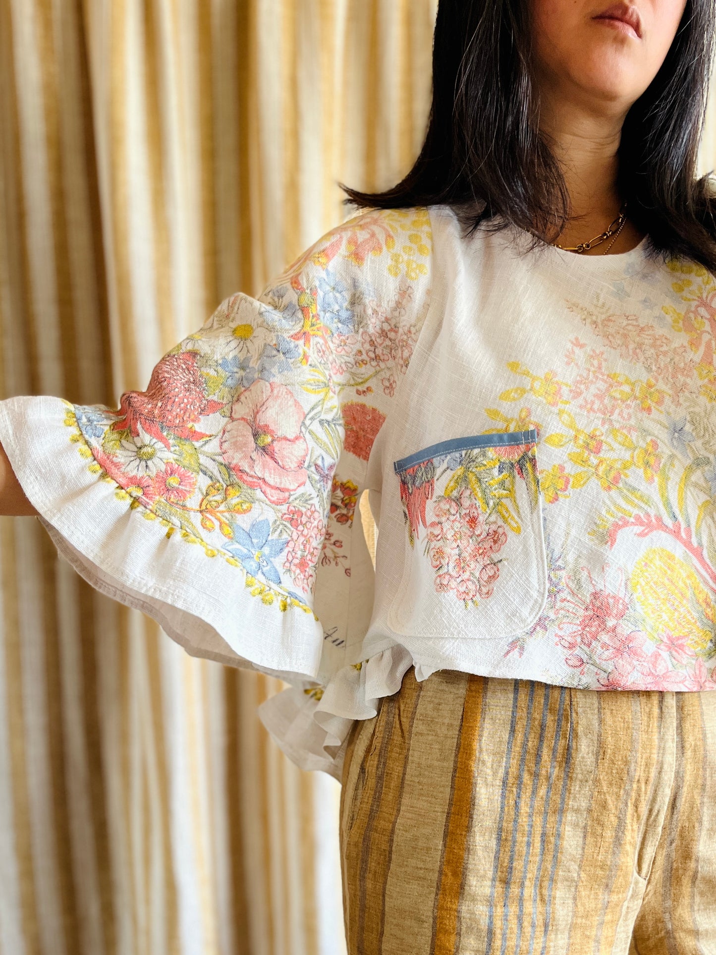 Circular and diagonal cut linen blouse