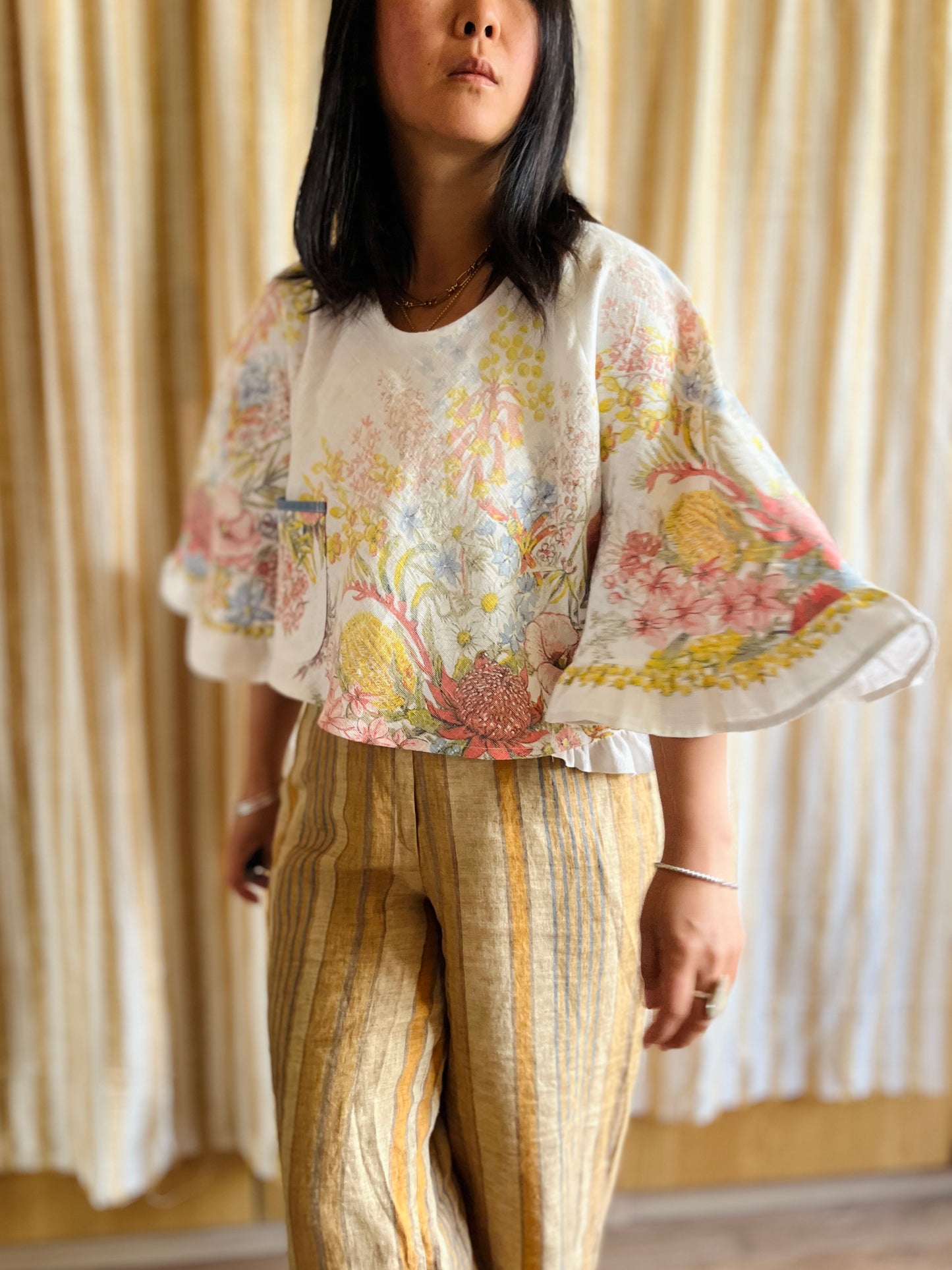 Circular and diagonal cut linen blouse