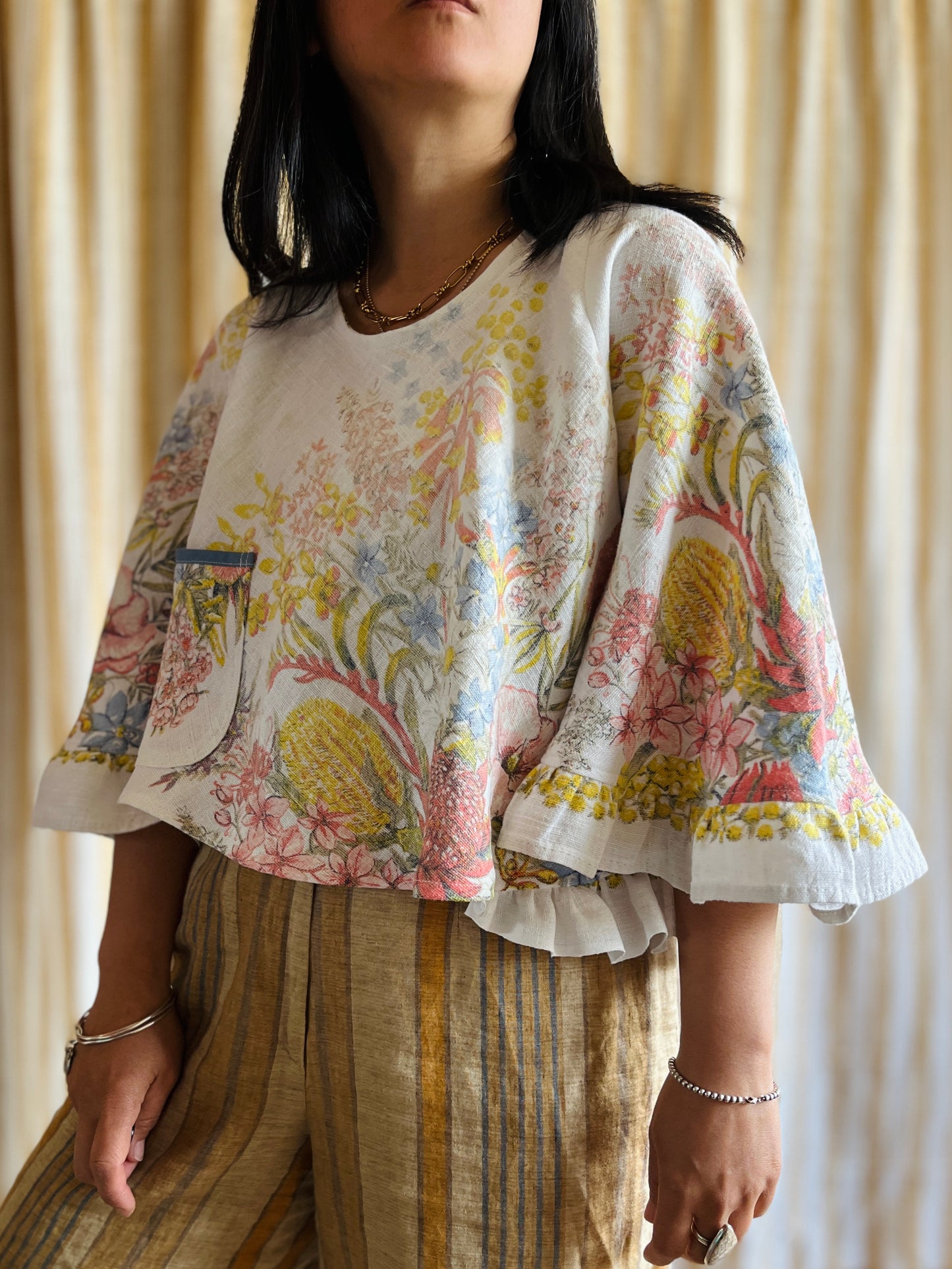 Circular and diagonal cut linen blouse