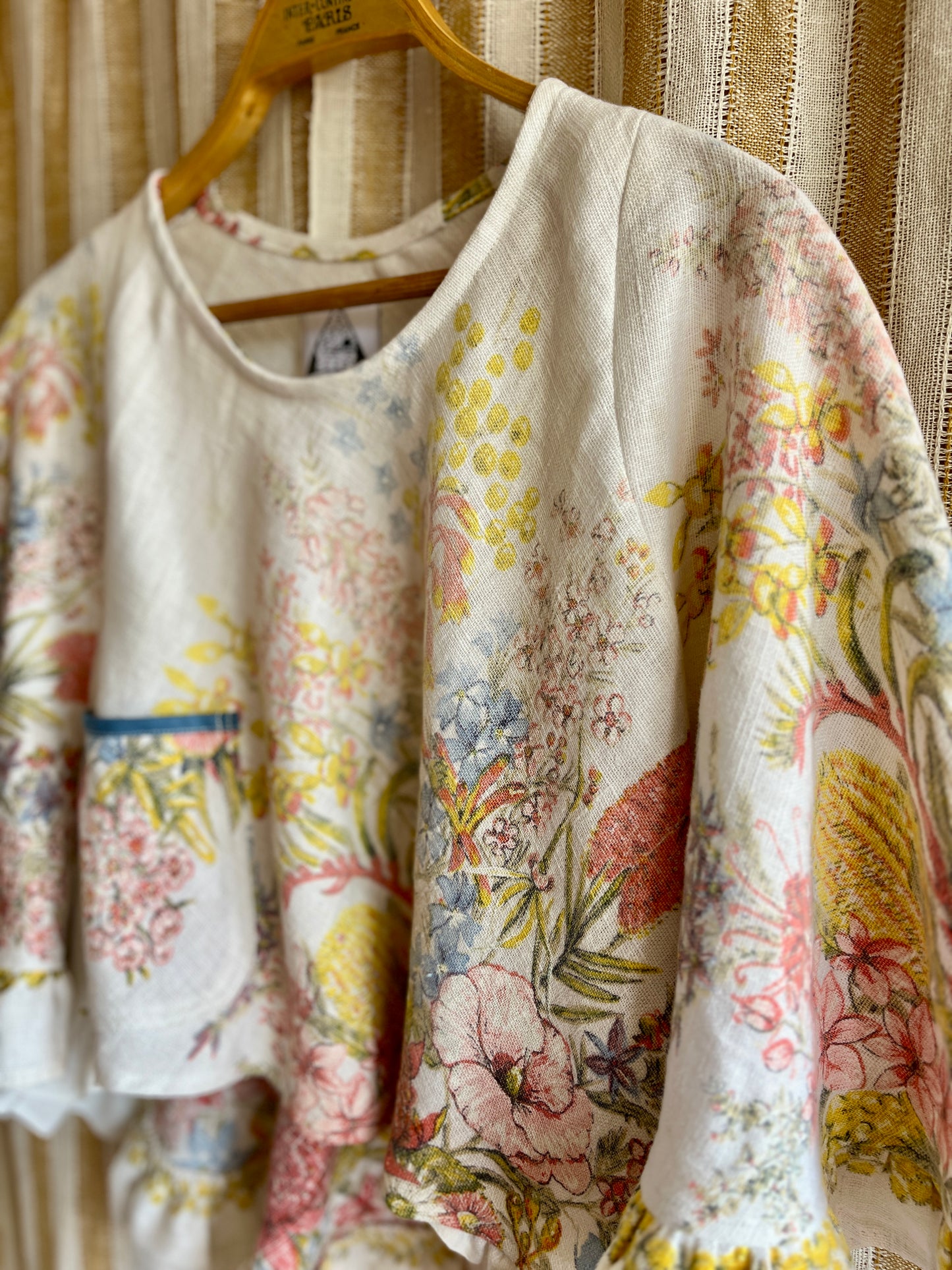Circular and diagonal cut linen blouse