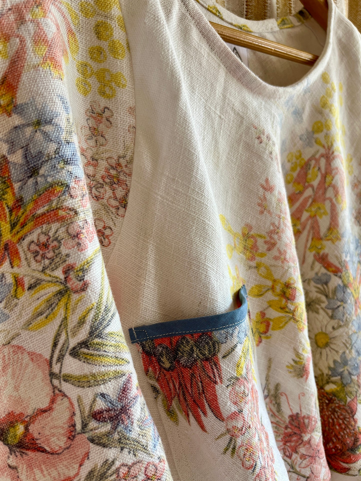 Circular and diagonal cut linen blouse