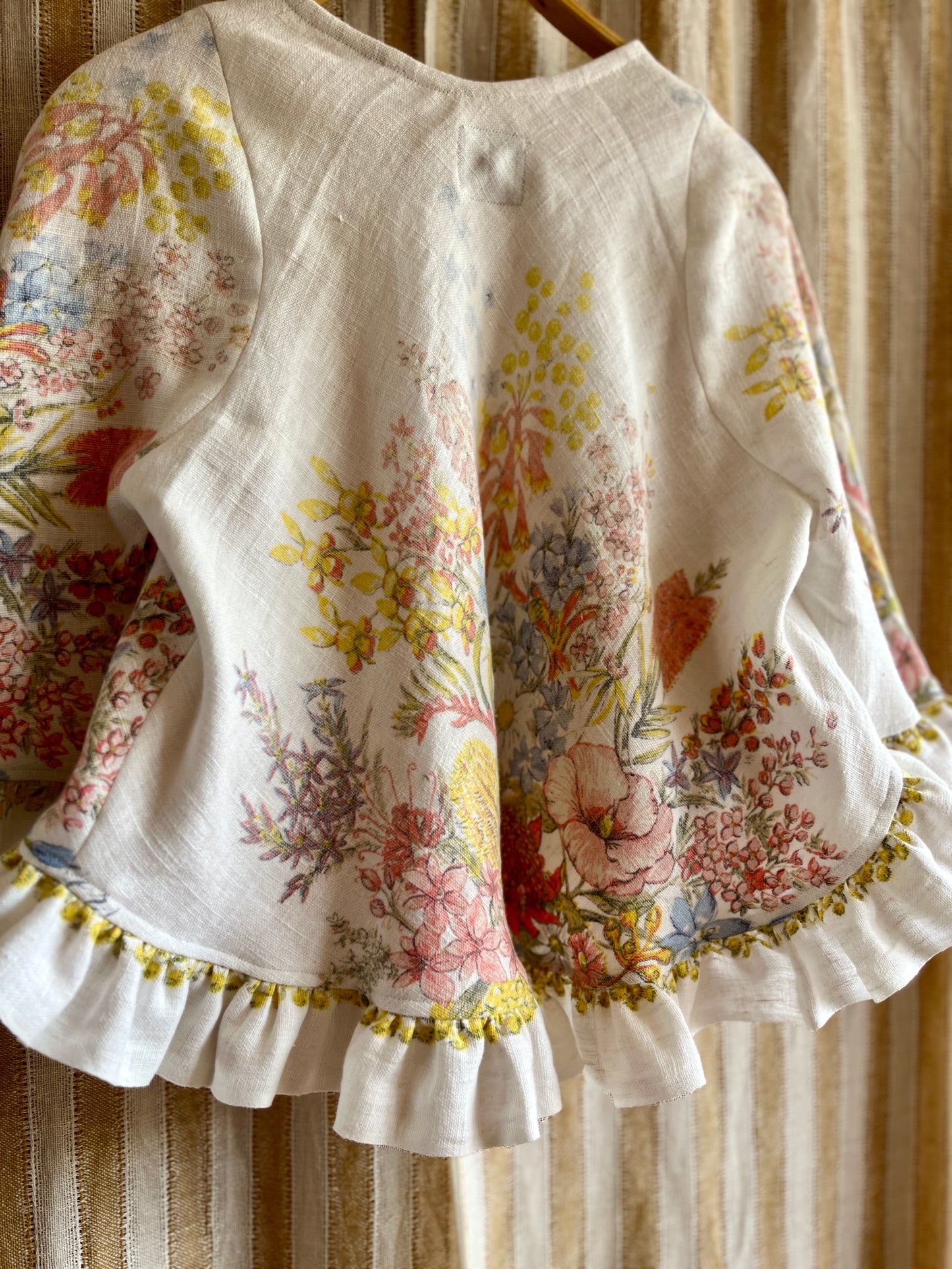 Circular and diagonal cut linen blouse
