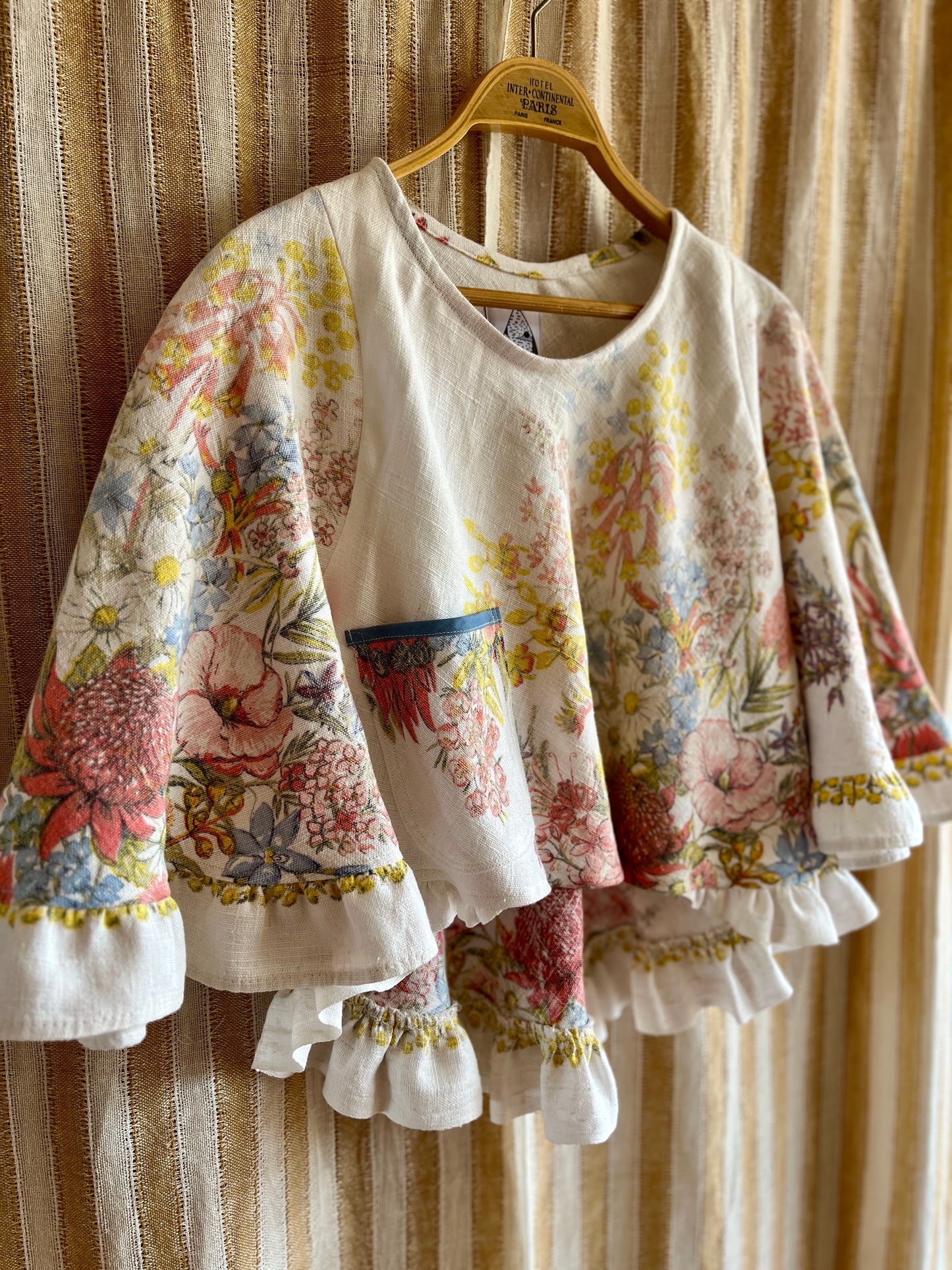 Circular and diagonal cut linen blouse